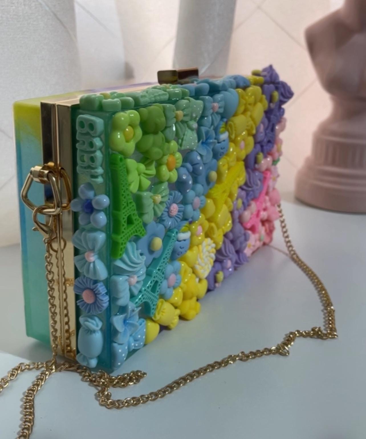charms clutch bag